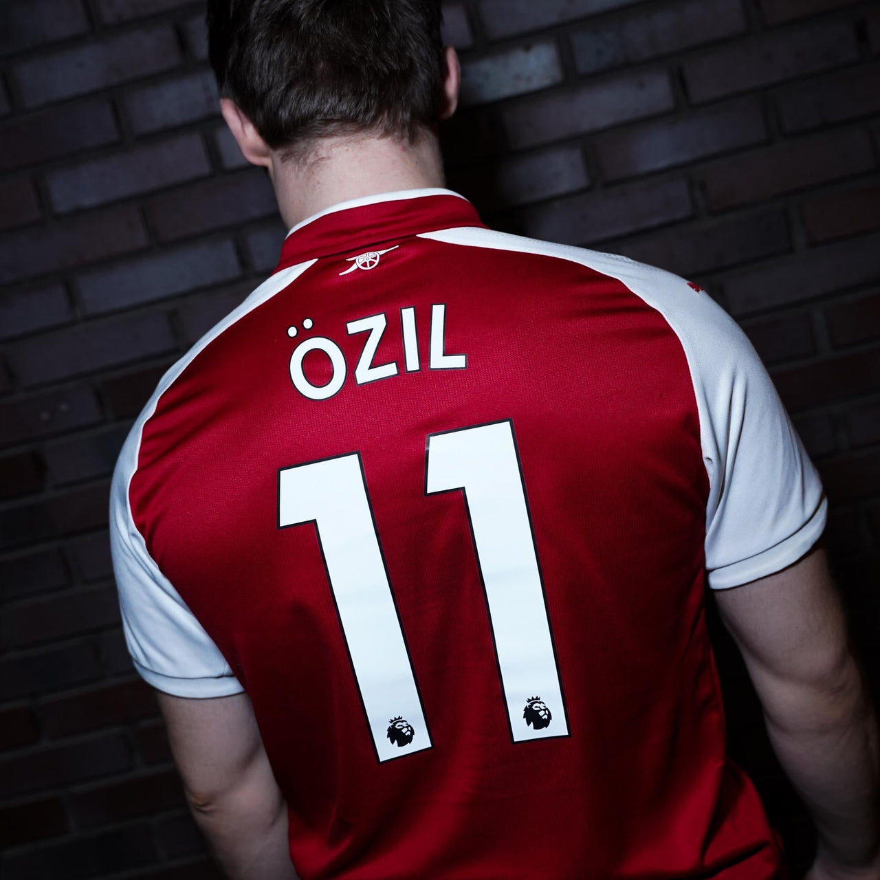 Vintage Arsenal football shirts, retro jerseys and classic kits celebrating Premier League history.