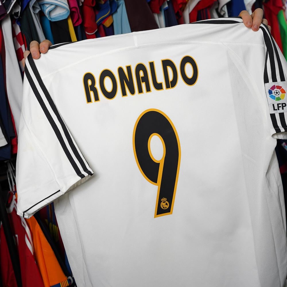 Vintage football shirts with retro player prints featuring legends like Messi, Ronaldo, Beckham and Henry.