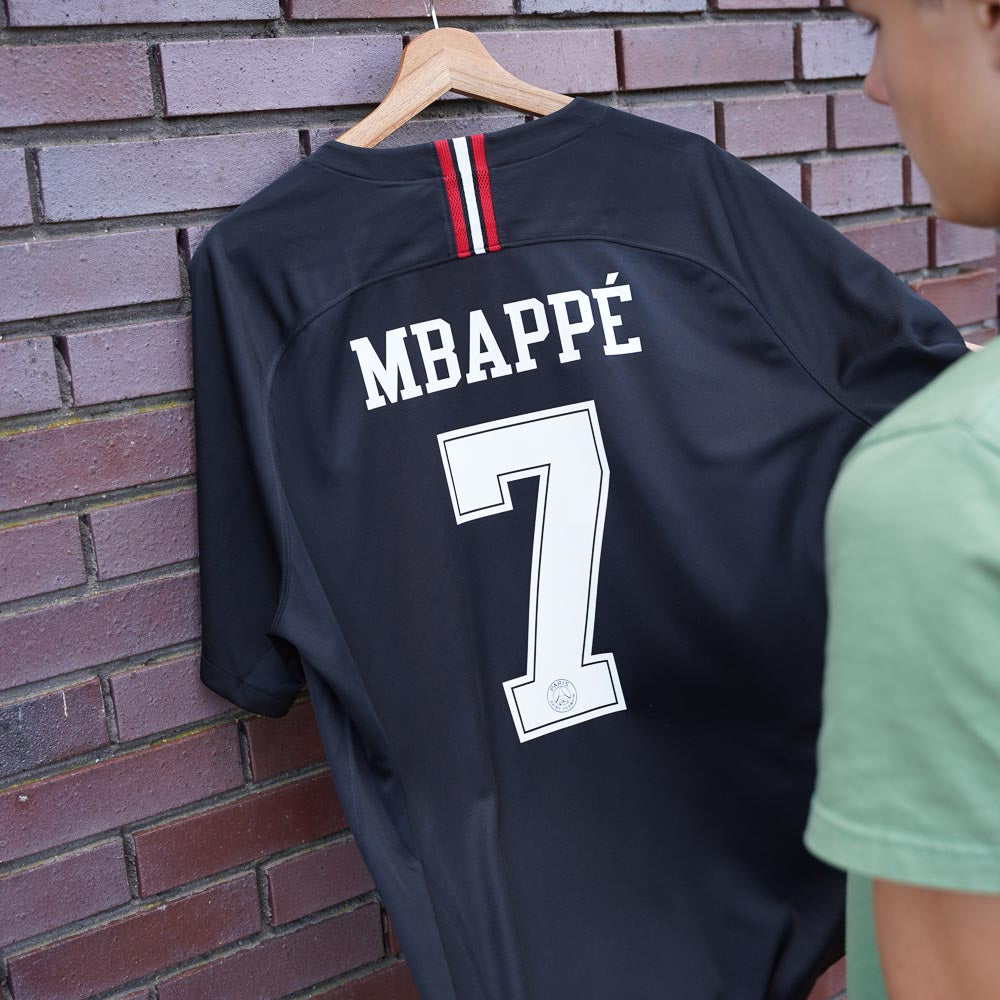 Retro PSG football shirts and vintage kits from Ligue 1 and European nights.
