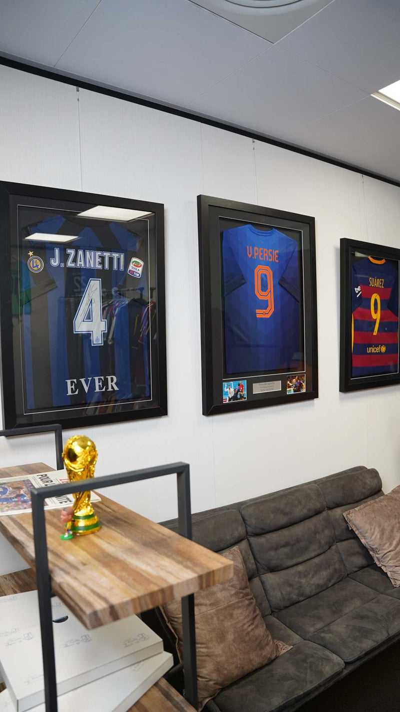 Our signed shirts wall ✍️